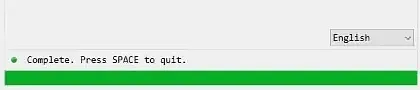A loader window reading Complete, press SPACE to quit with a full green progress bar